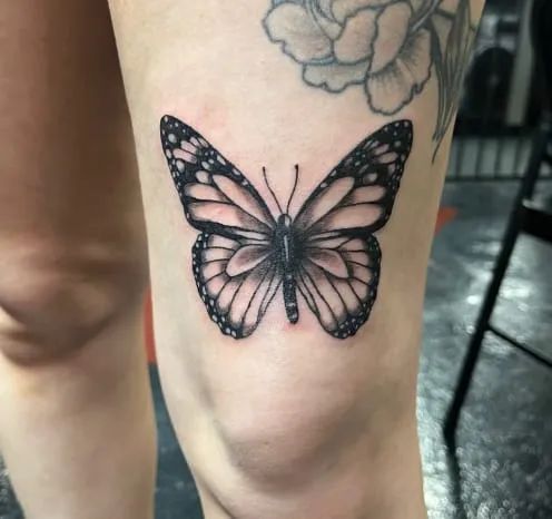 Astounding Above Knee Tattoo Idea