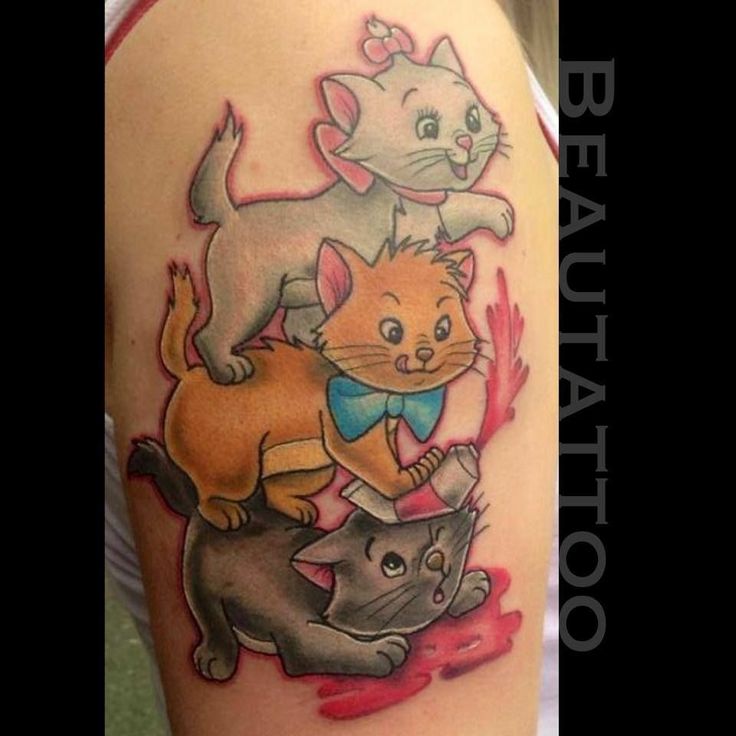 Charming kitten fantasy tattoo