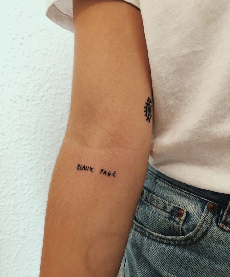Tattoo with a bank note symbol