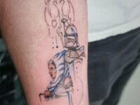 1-Cute-Color-inked-Ahsoka-with-Her-Light-Sword-Tattoo-on-Forearm