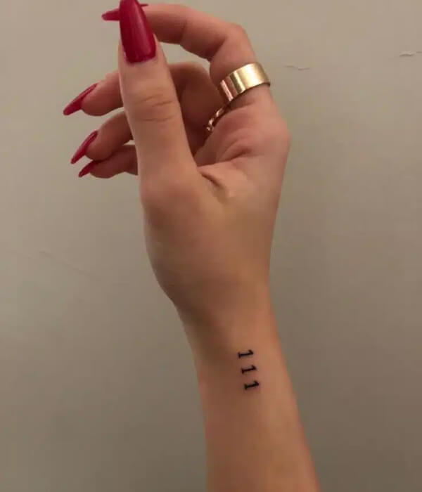 111 angel number tattoo