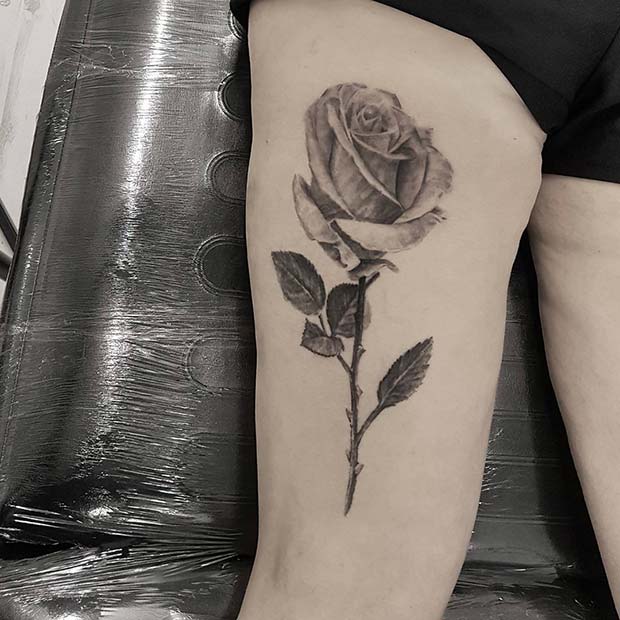 Delicate Floral Tattoos on Back Thigh