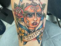 17-Cute-Color-Inked-Ahsoka-face-with-Name-Tattoo-on-Forearm