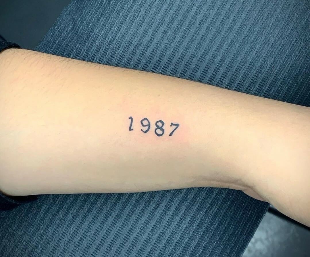 1987 Tattoo with Symbols