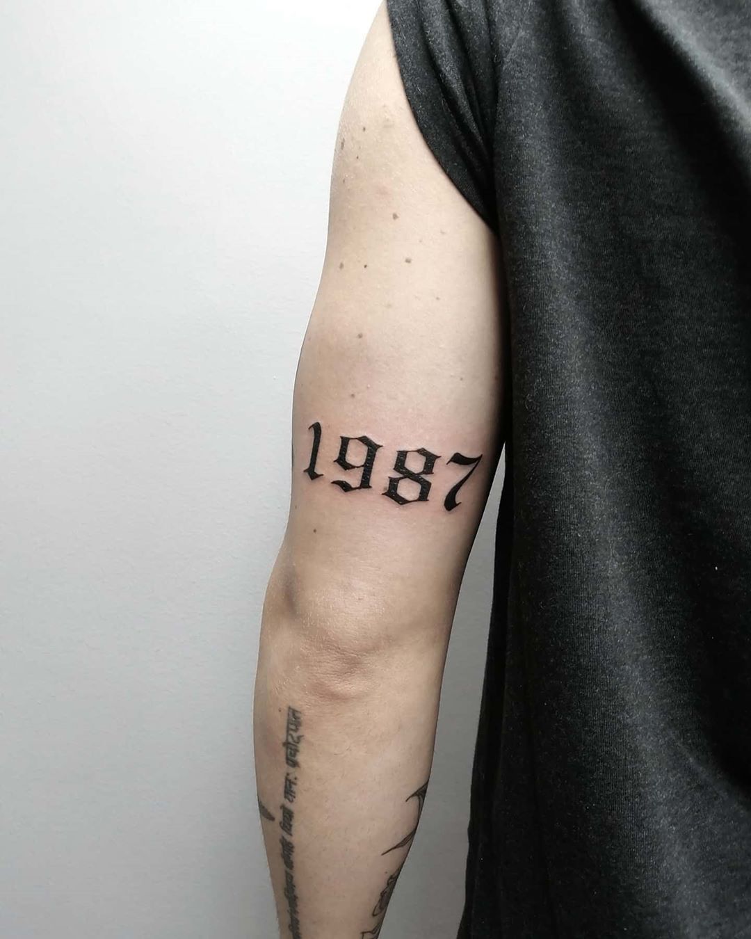 Minimalist 1987 Tattoo