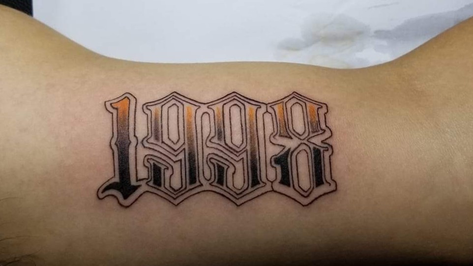 Playful 1998 tattoo design