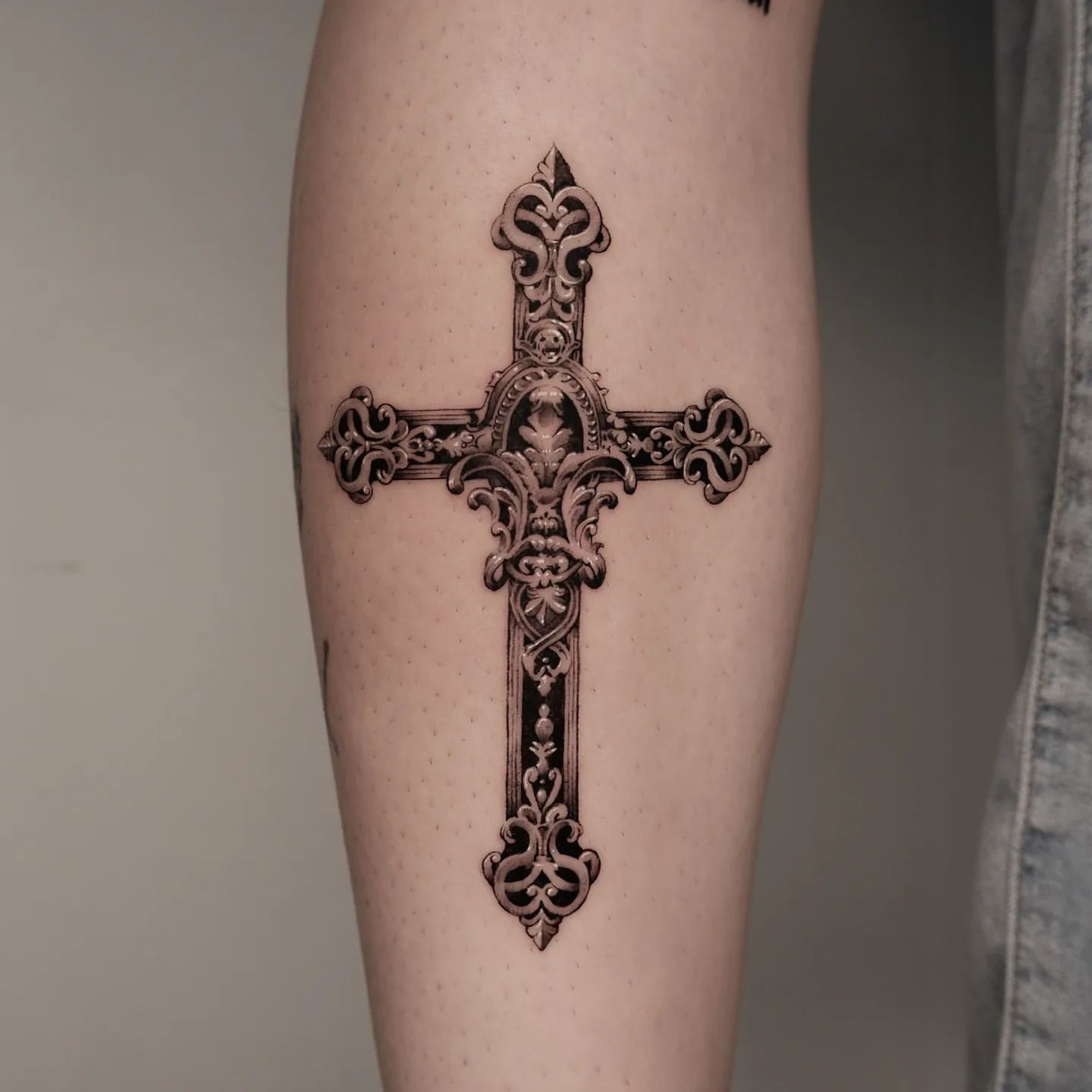 Upper Arm Cross Tattoo