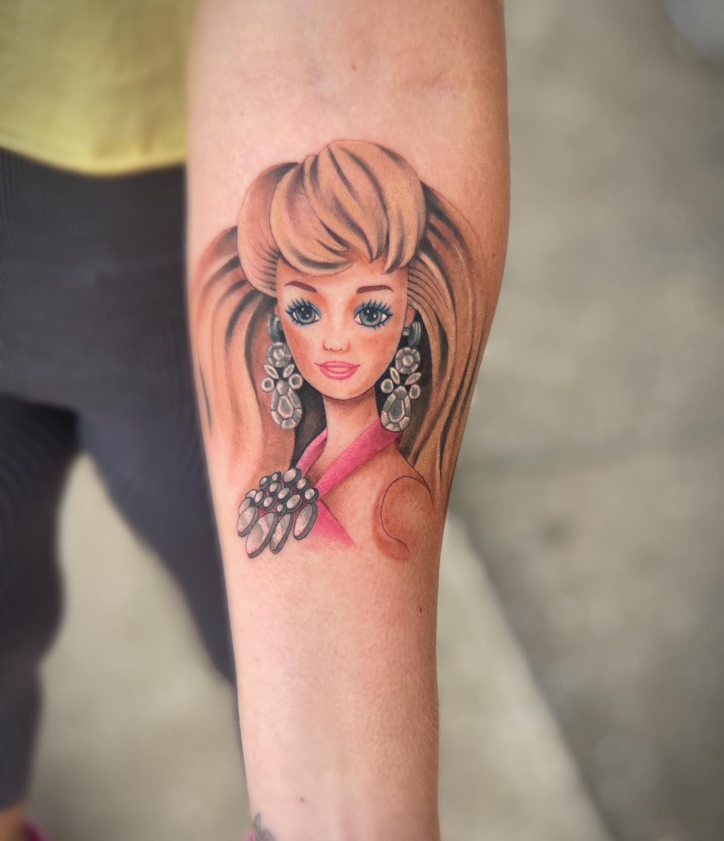 Playful Barbie Tattoo Idea