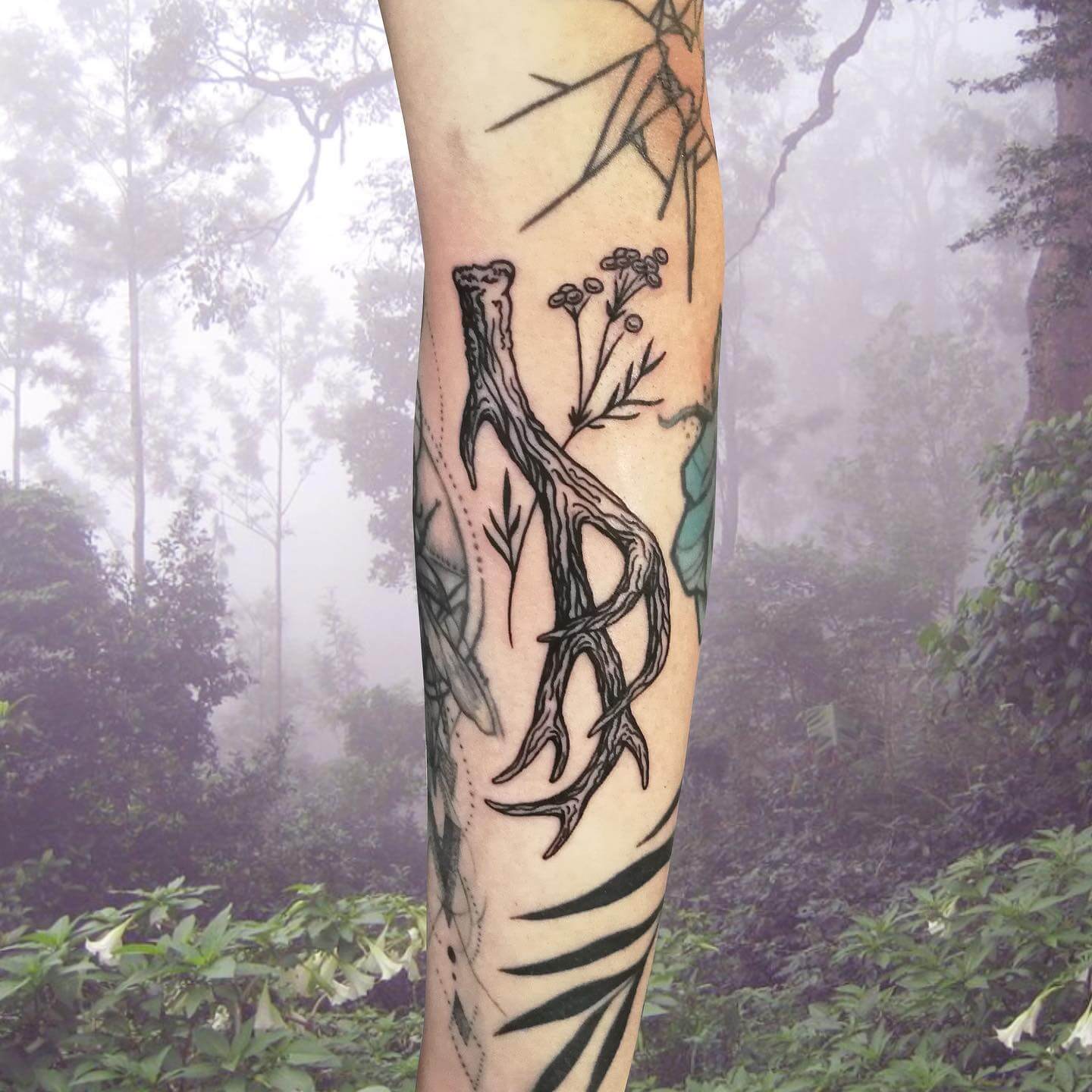 Stunning Deer Antler Tattoo Idea