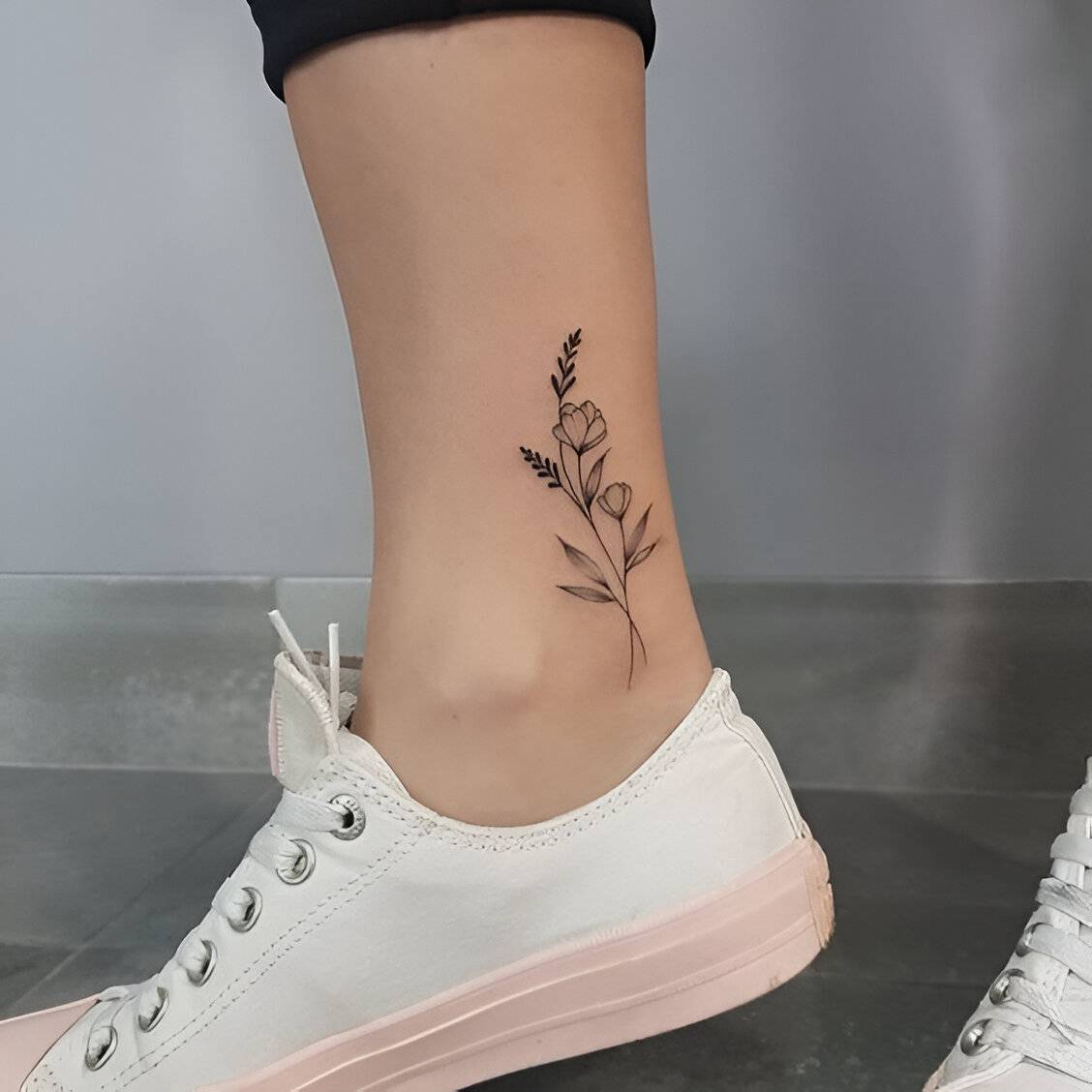 Elegant Floral Design Ankle Tattoo