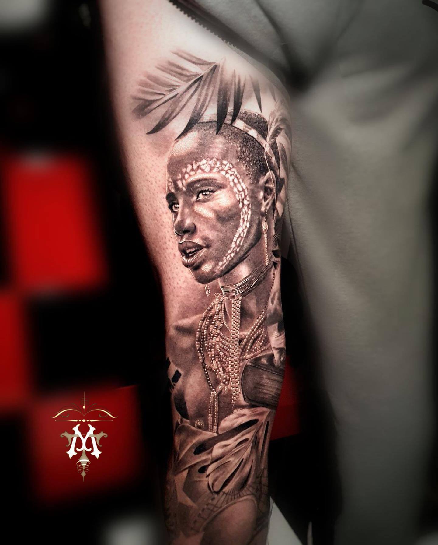 Bold African warrior tattoo on the back