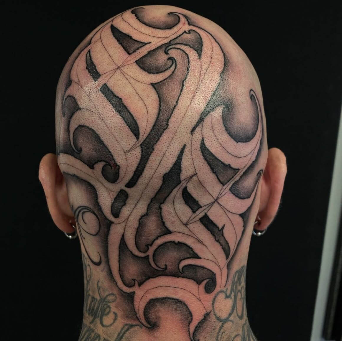 Intricate Abstract Back of Head Tattoo