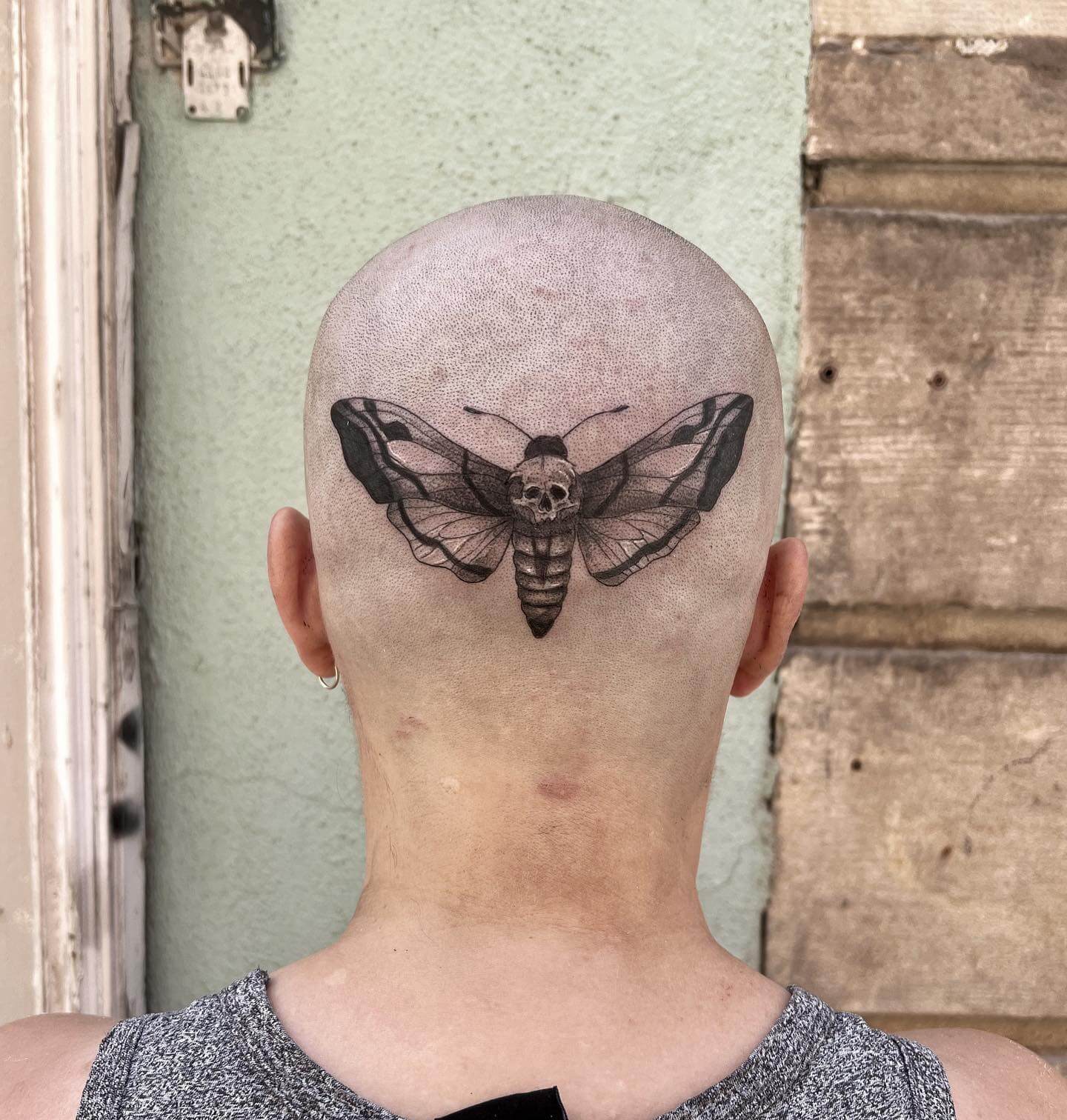 Wildlife Back of Head Tattoo