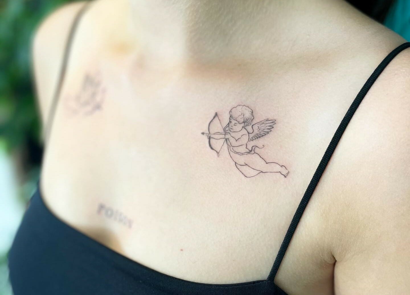 Dynamic Angel Chest Tattoo