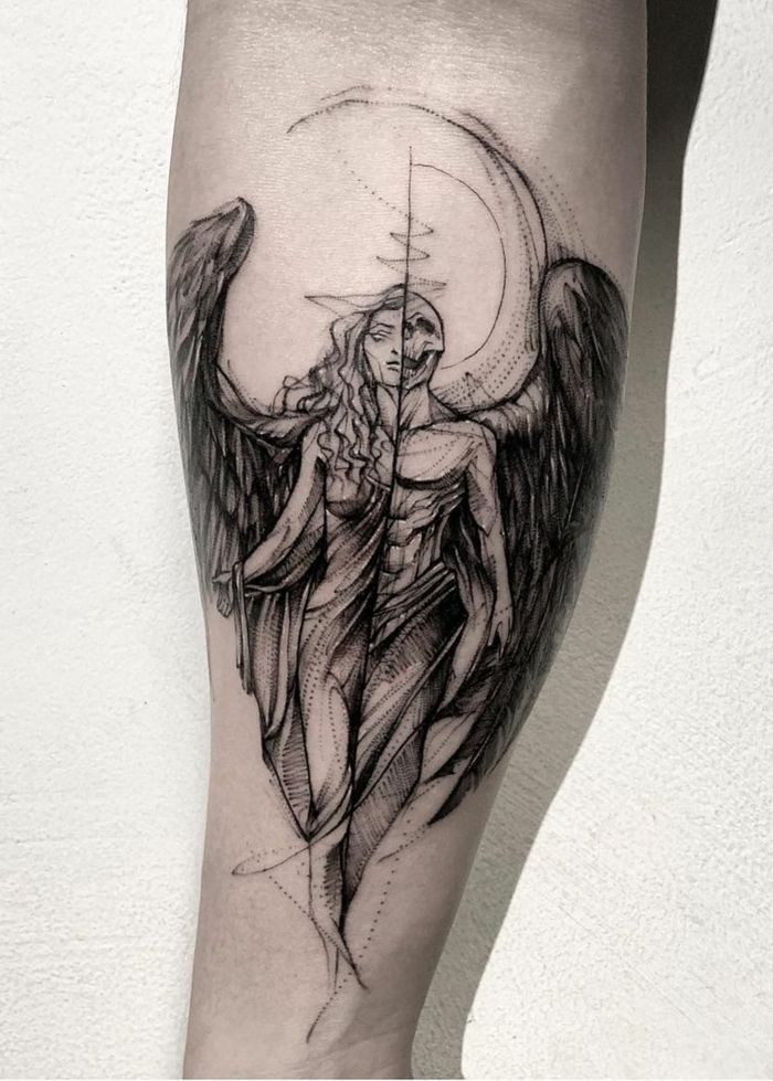 Black and White Tattoo of a Woman: Half Angel, Half Demon