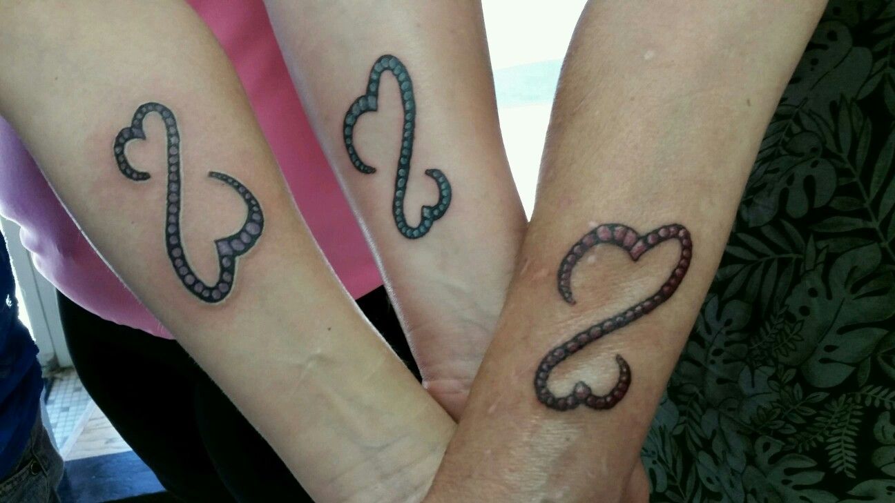 Three generation tattoo with grandmother, mother, and daughter