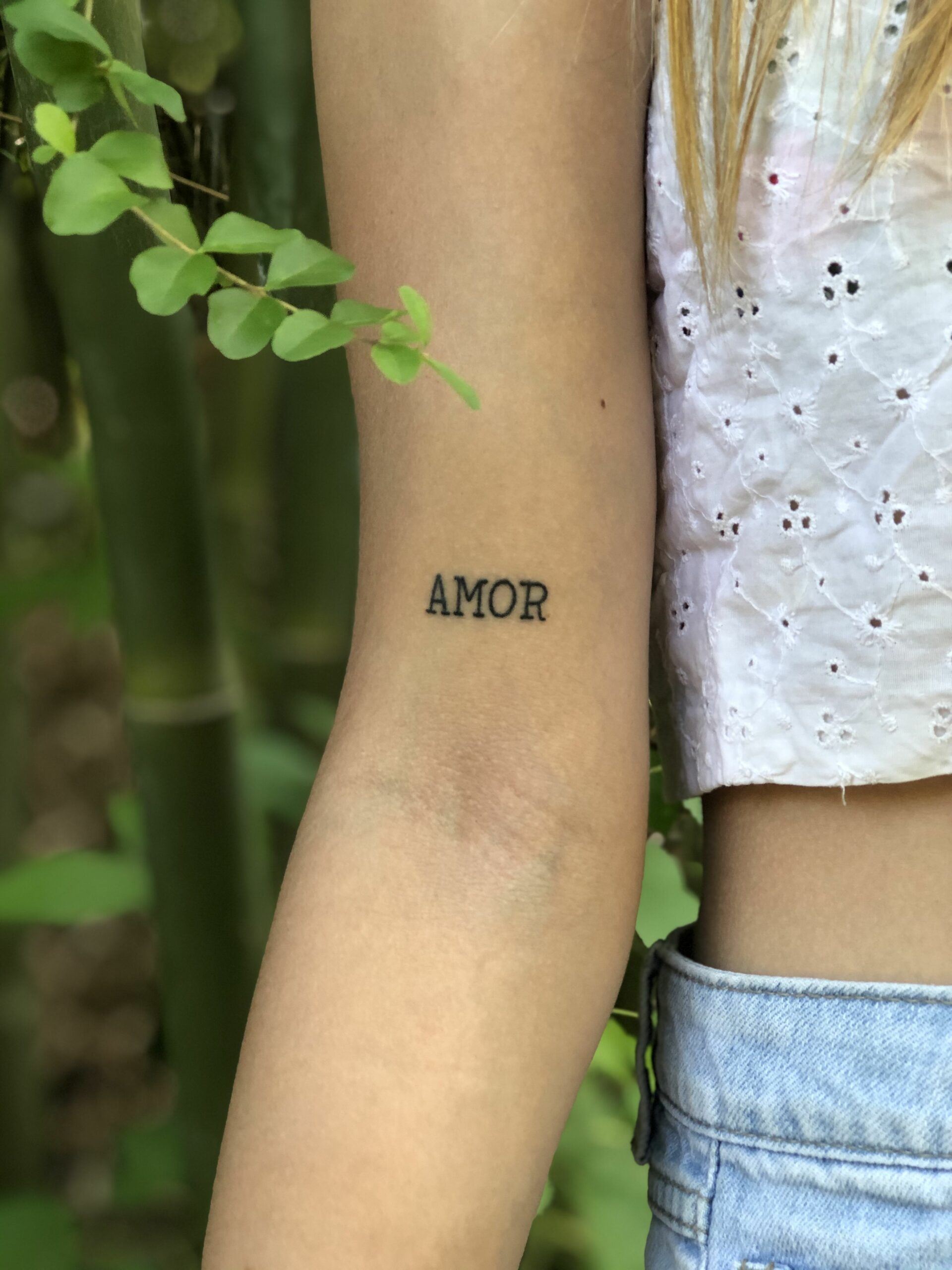 Simple love tattoo on wrist