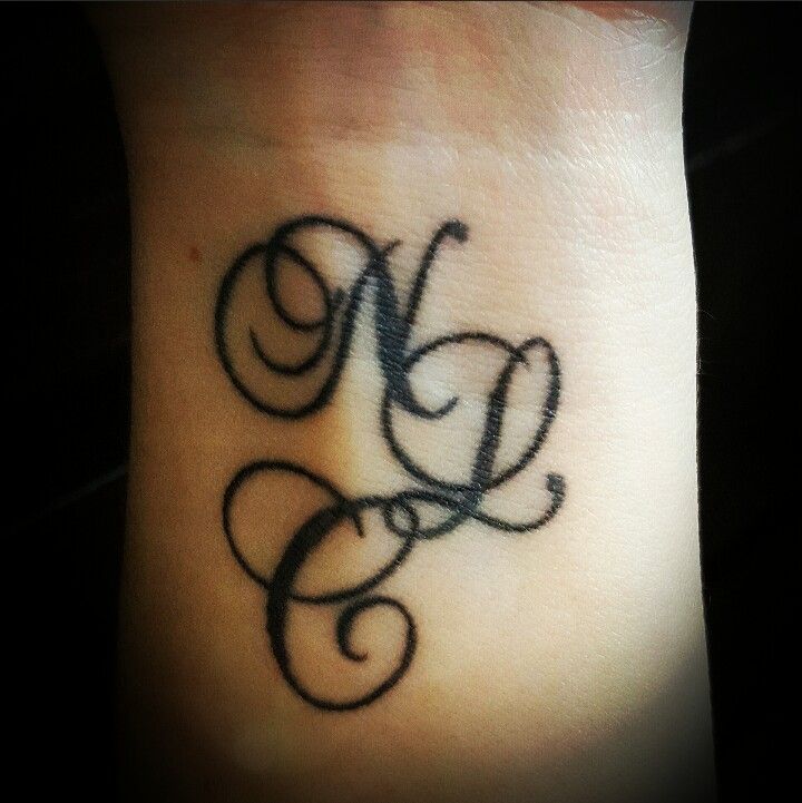 Family Legacy Initial Tattoo