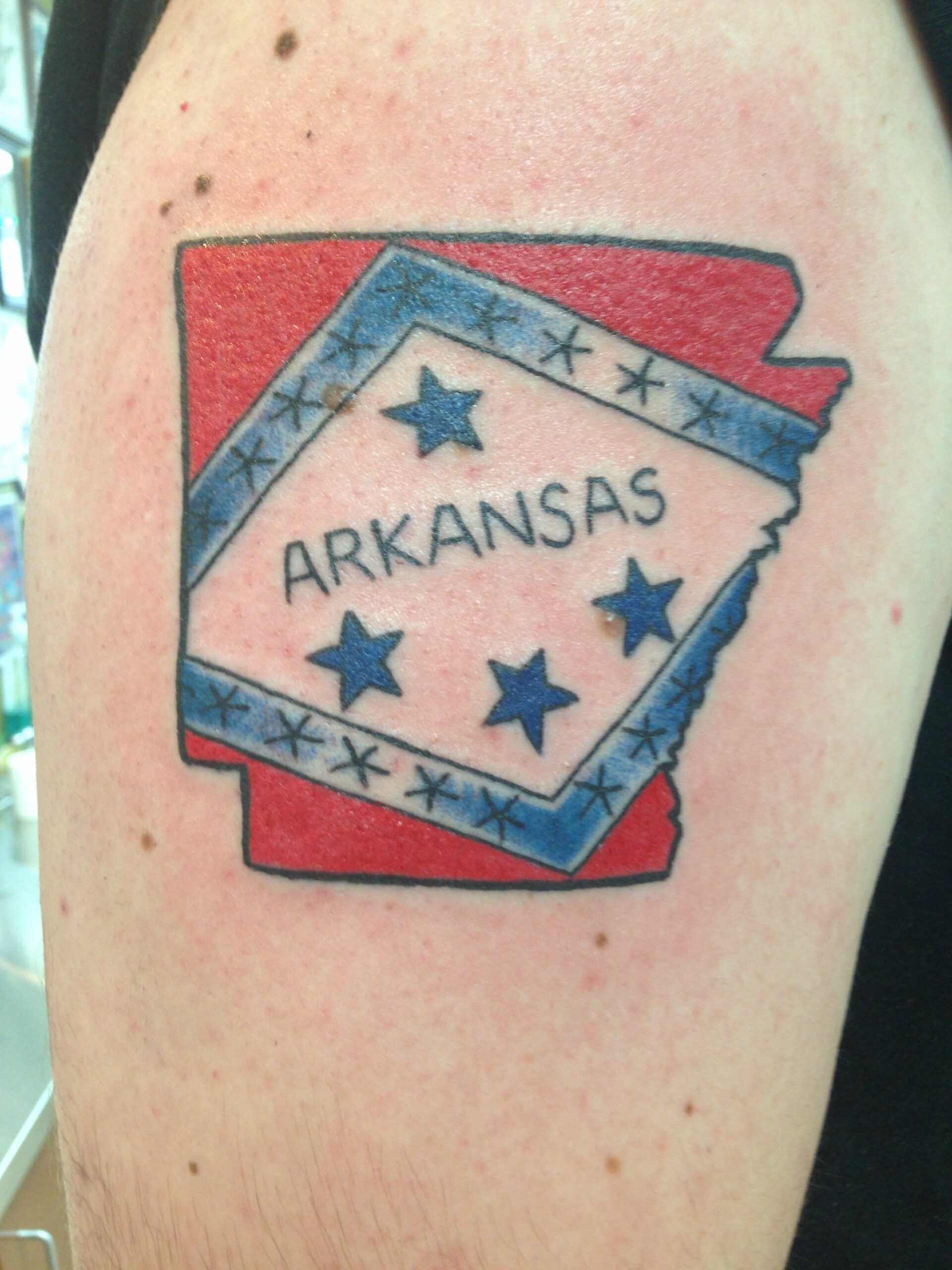 Arkansas state tattoo by Nancy Miller at Main Street Tattoo | State