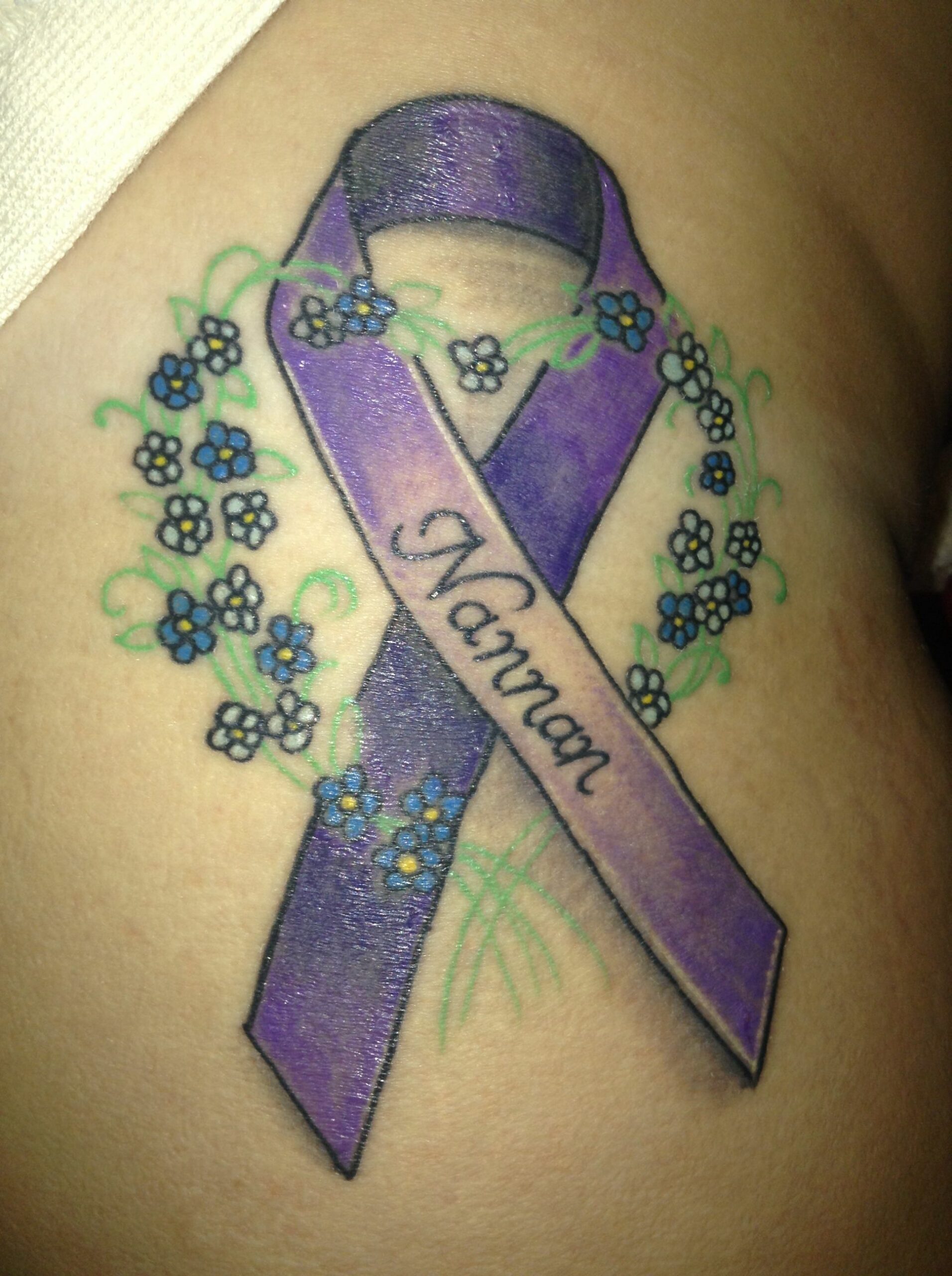 Forget me not flowers tattoo