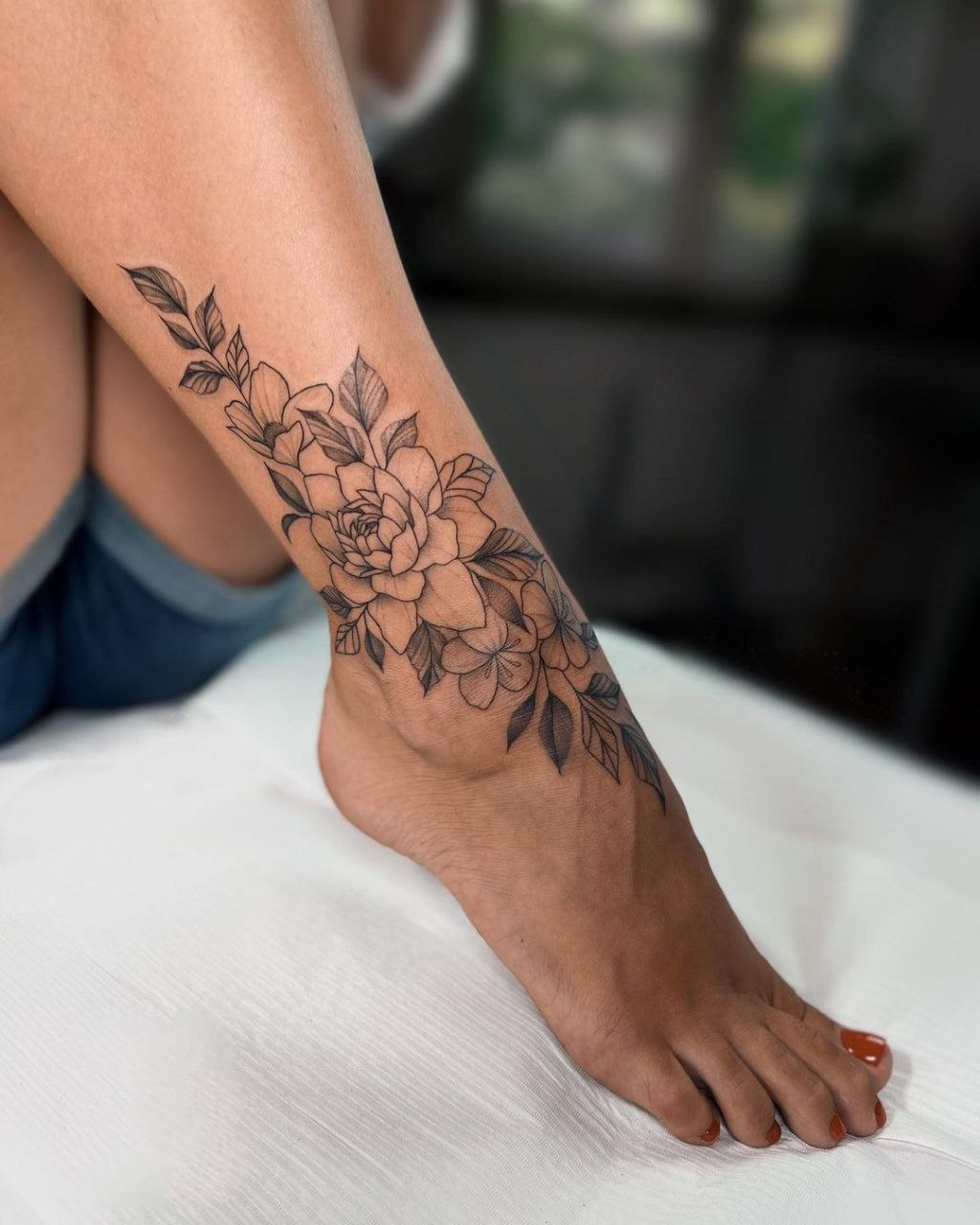 Girly foot tattoo displaying various styles