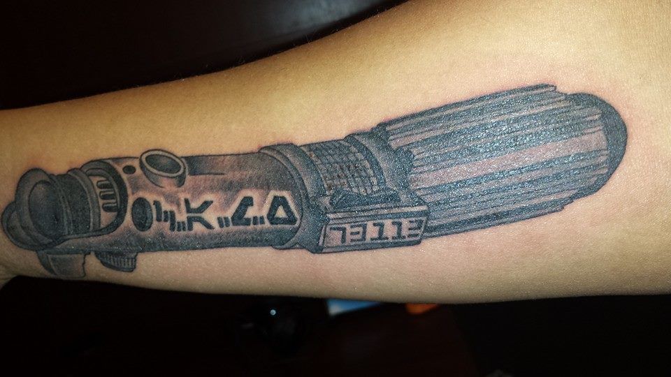 Anakin Skywalker’s lightsaber on my forearm. [Art Freek - Providence