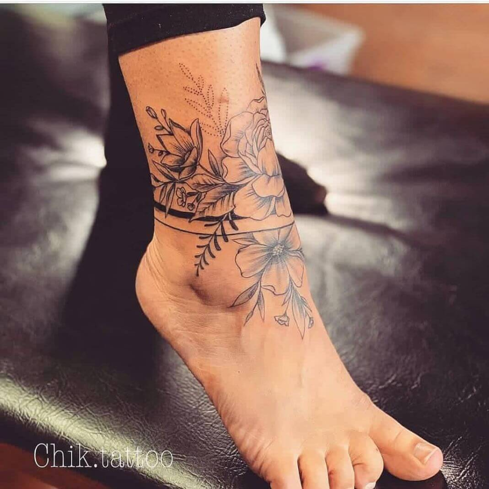 Floral ankle tattoo design