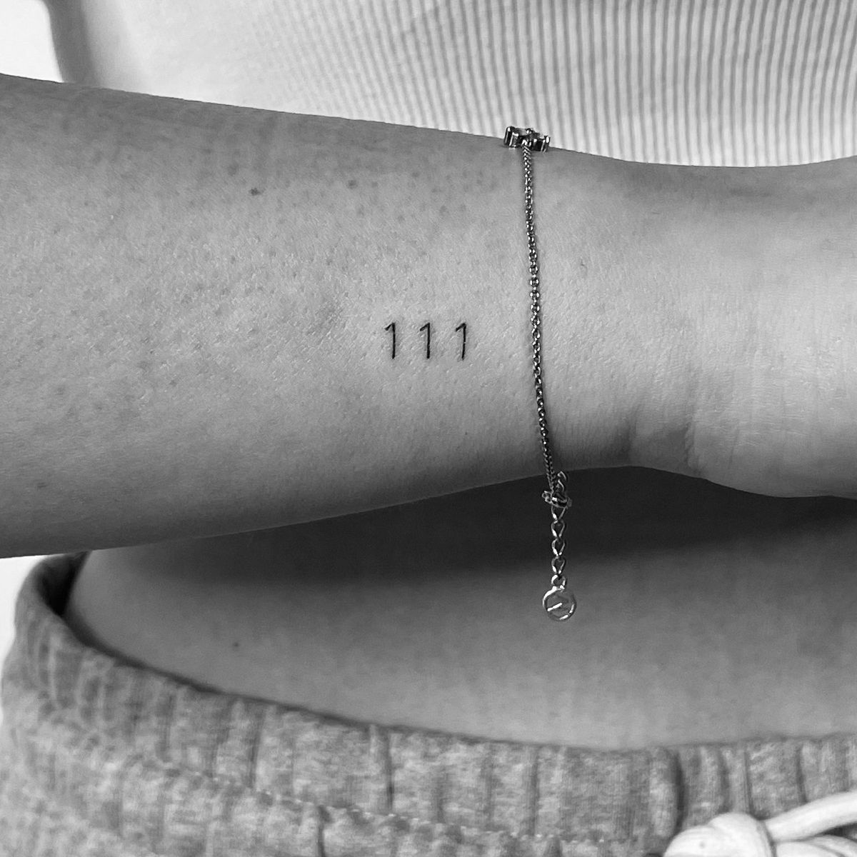 Minimalist 111 tattoo