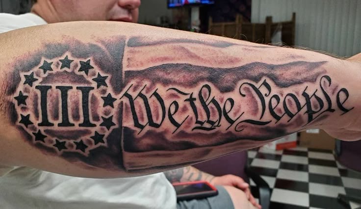 Tattoo designs that include 'We The People'
