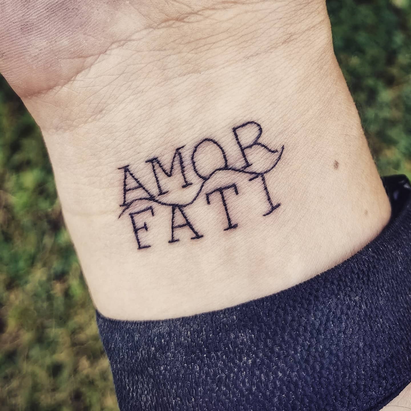 Abstract Amor Fati Tattoo