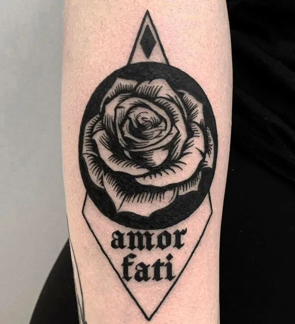 Elegant Amor Fati Tattoo in Script