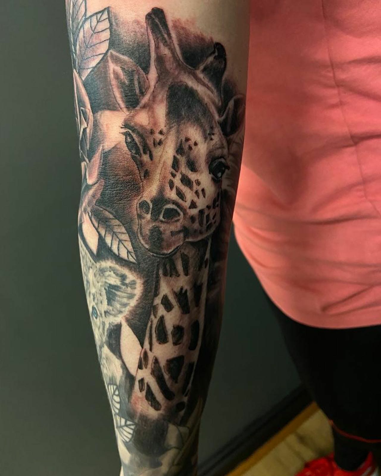 Dynamic animal sleeve tattoo