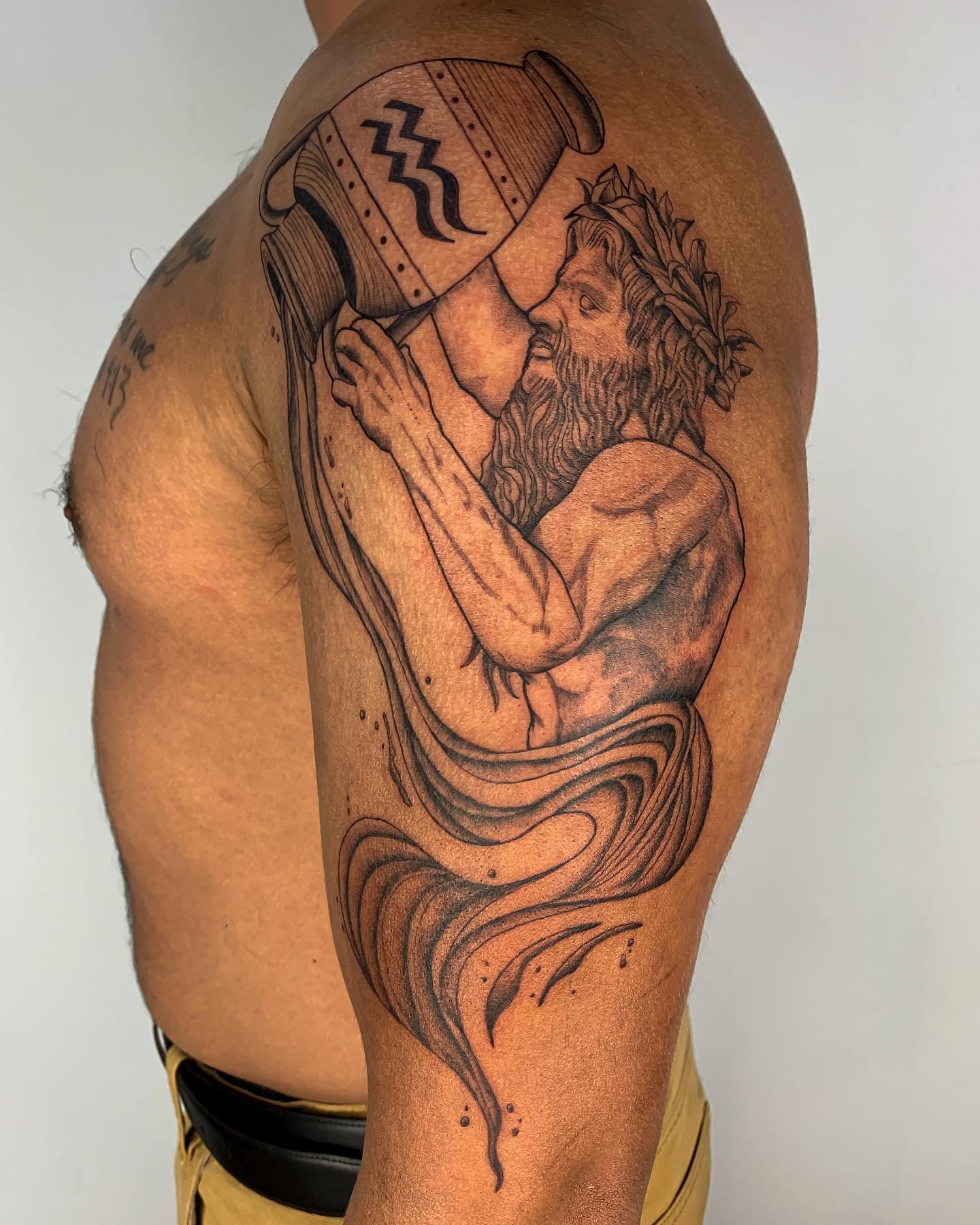 Mythical God Pouring Water Aquarius Tattoo Design