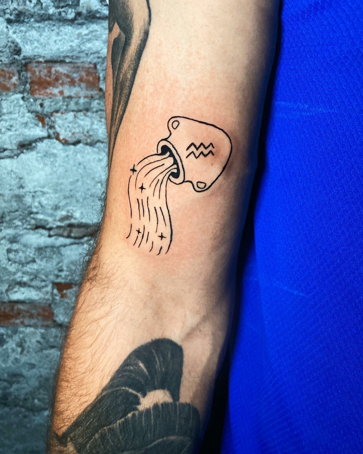 Symbolic Aquarius Pot Tattoo