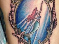 Ariel-within-the-Mirror-Tattoo-Design-on-Thigh