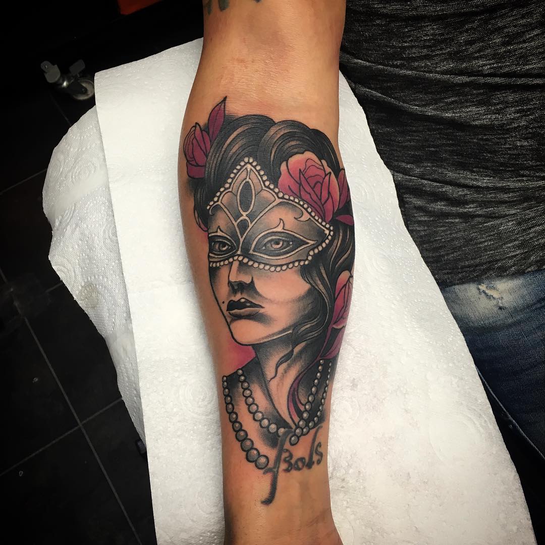 Symbolic Designs Arm Tattoo