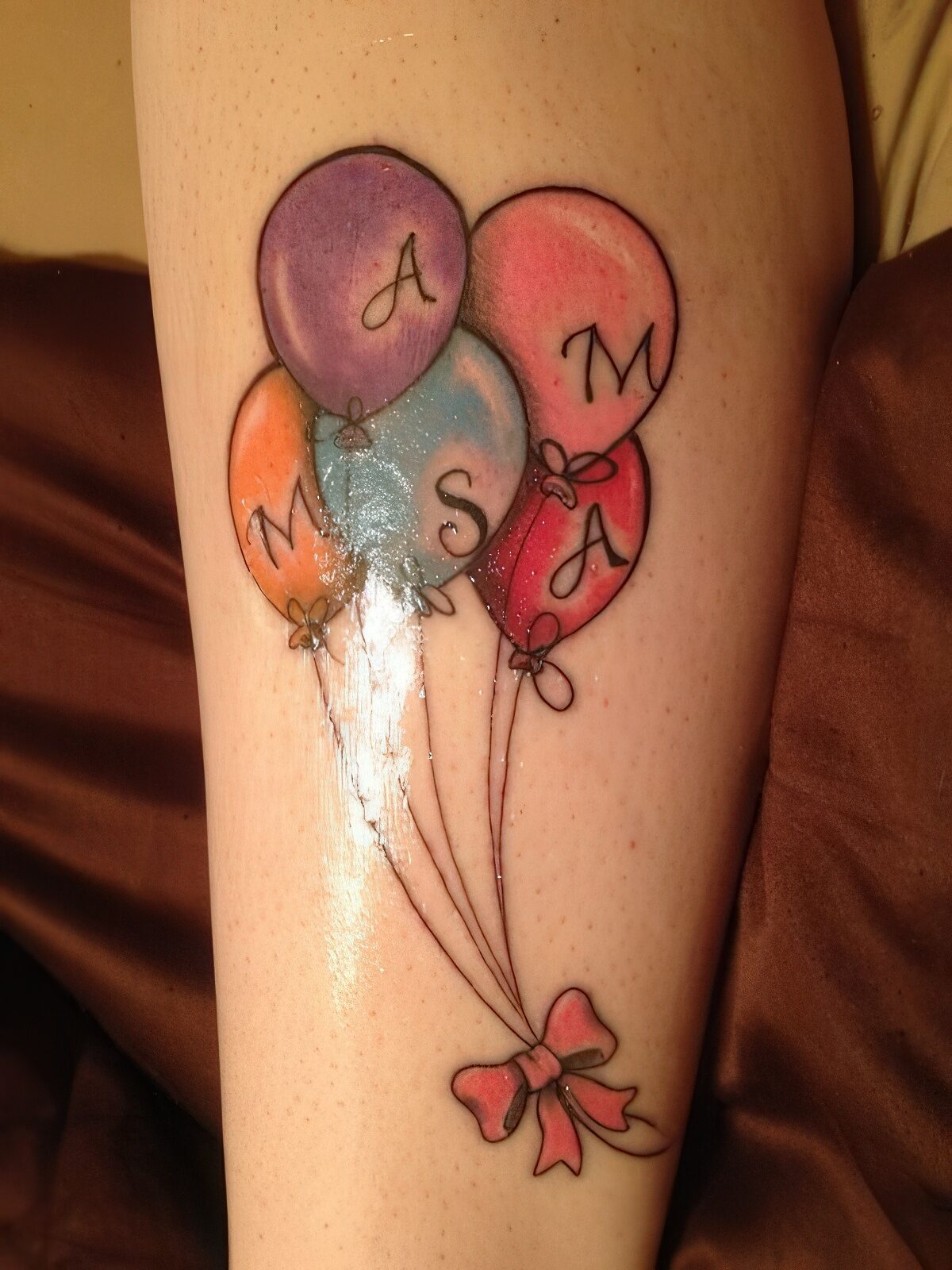Balloons and Bow Tattoo