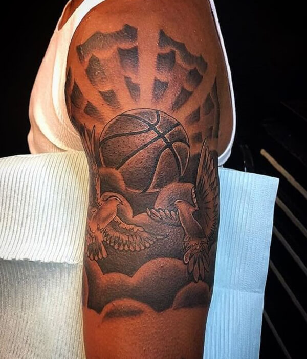 Basketball tattoo with clouds