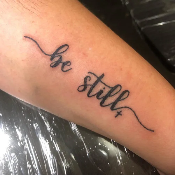 Bold Typography Be Still Tattoo