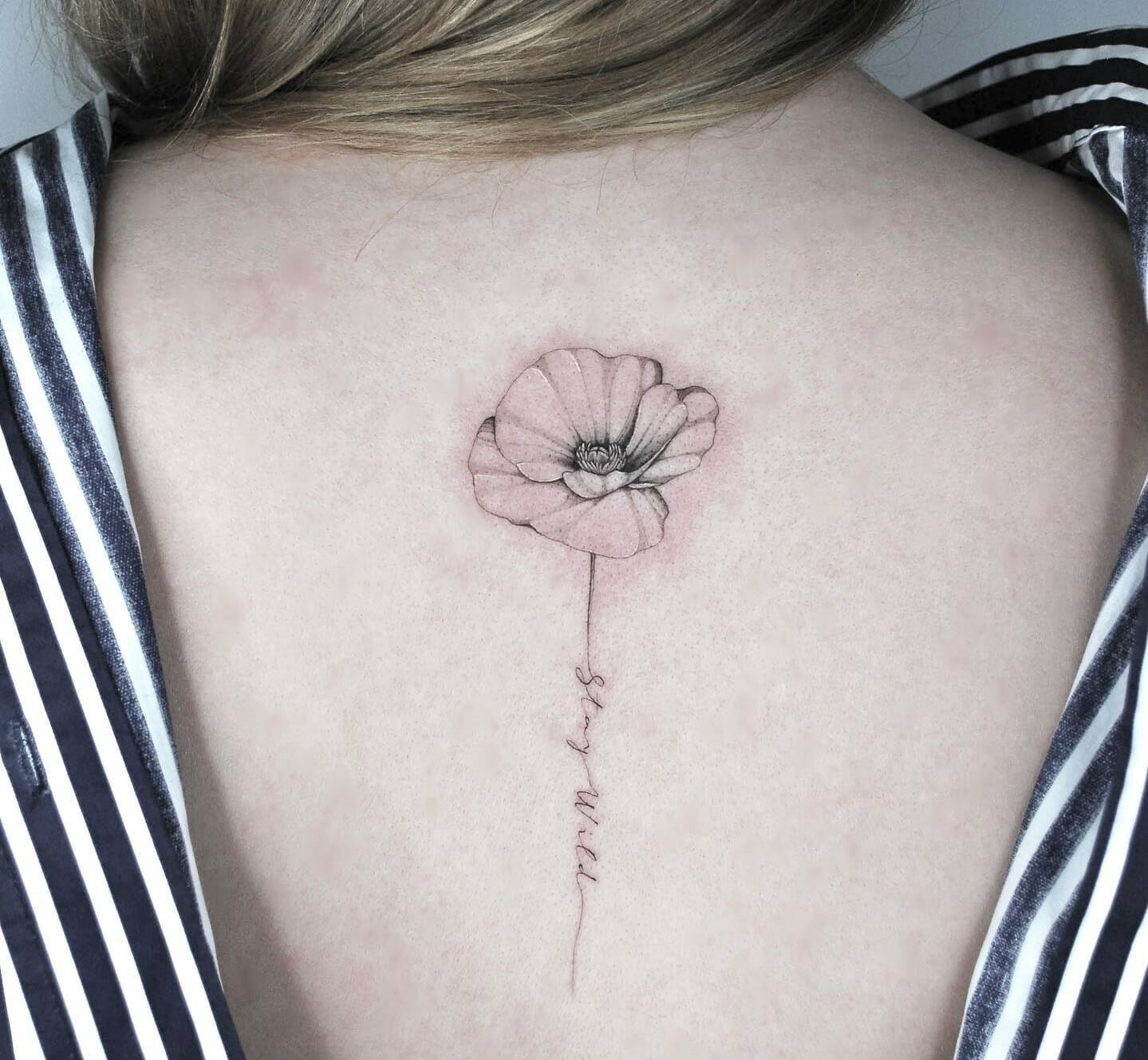 Vibrant Back Flower Tattoo