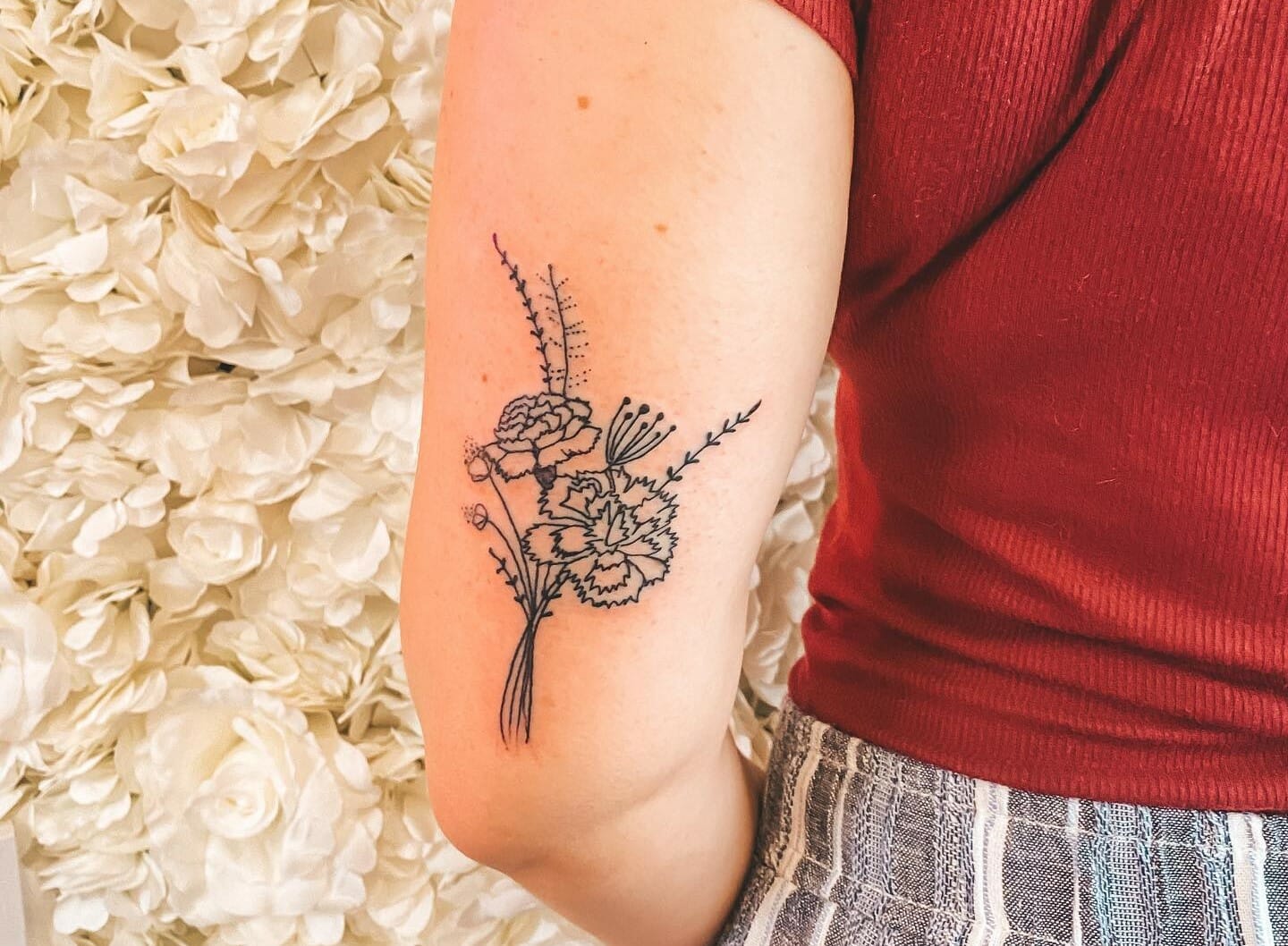 Elegant Floral Back Of Arm Tattoo