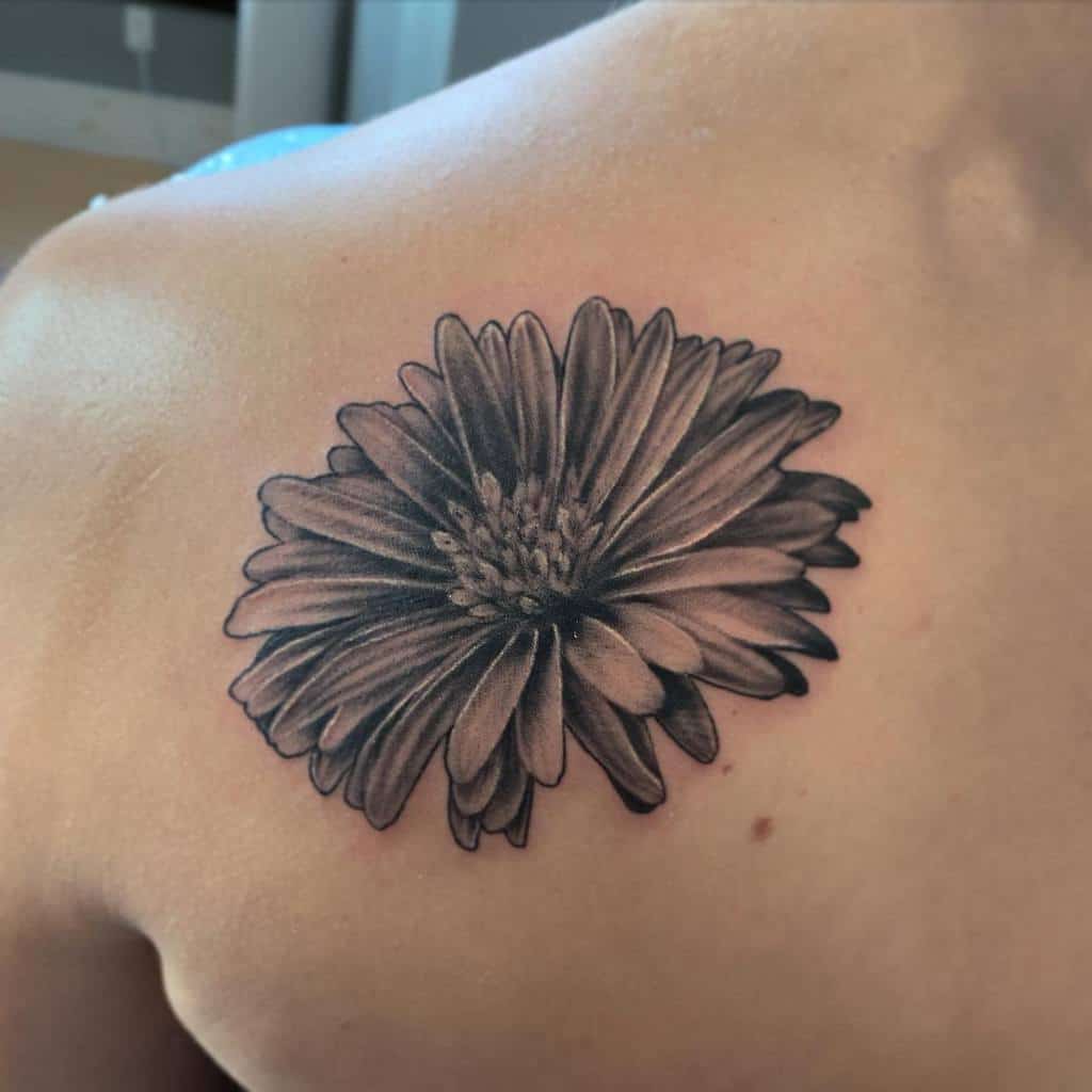 Black Aster Flower Tattoo