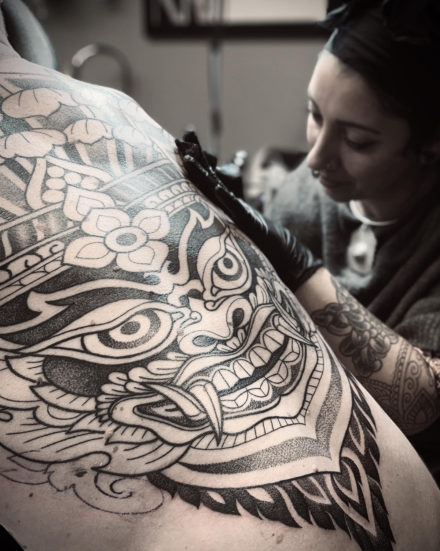 Intricate back tattoo