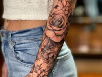 Classy-upper-arm-tattoos-females-3658db47cef58410531864f8471ea26