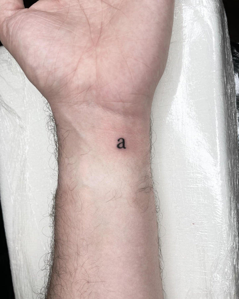 Minimalist Monogram Tattoo