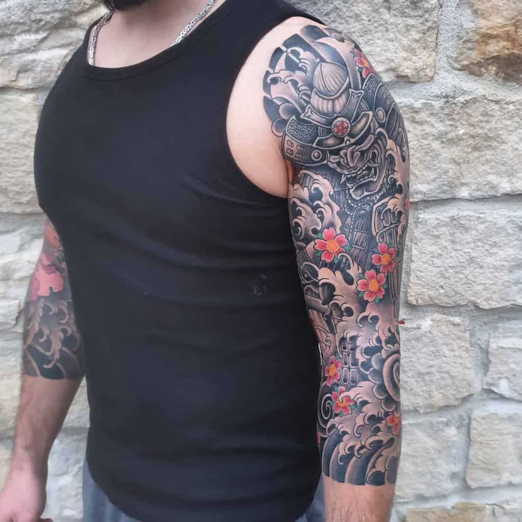 Japanese themed 3/4 sleeve tattoo with traditional elements