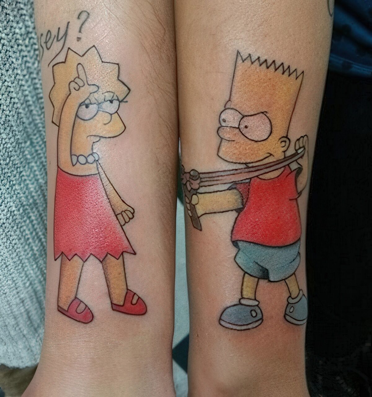 Picture Of Matching Bart and Lisa tattoos