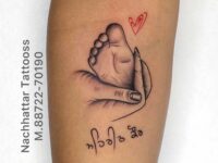 Mother-Holding-Childs-feet-Tattoo