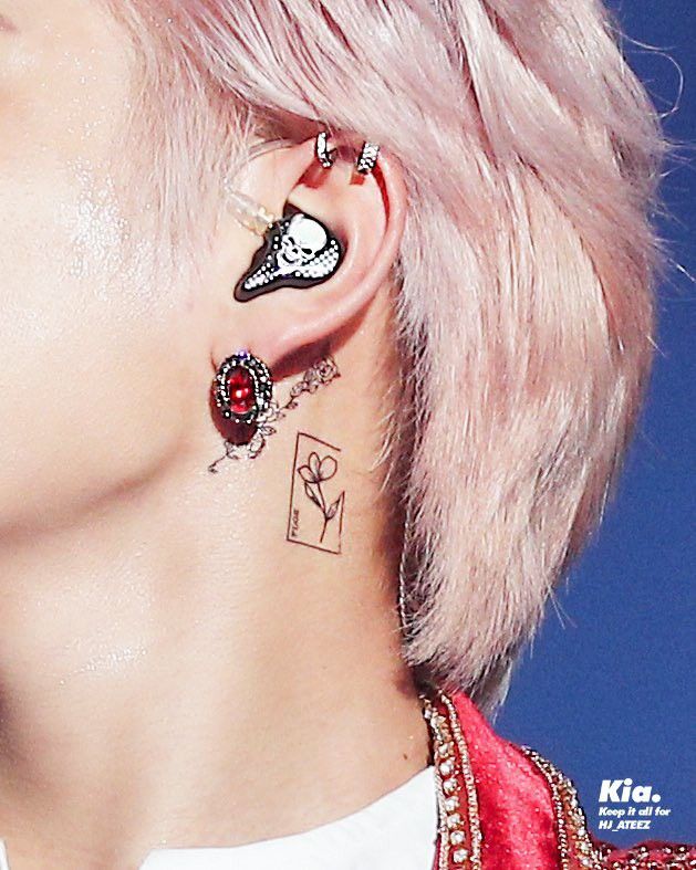 Numerous tattoos and piercings
