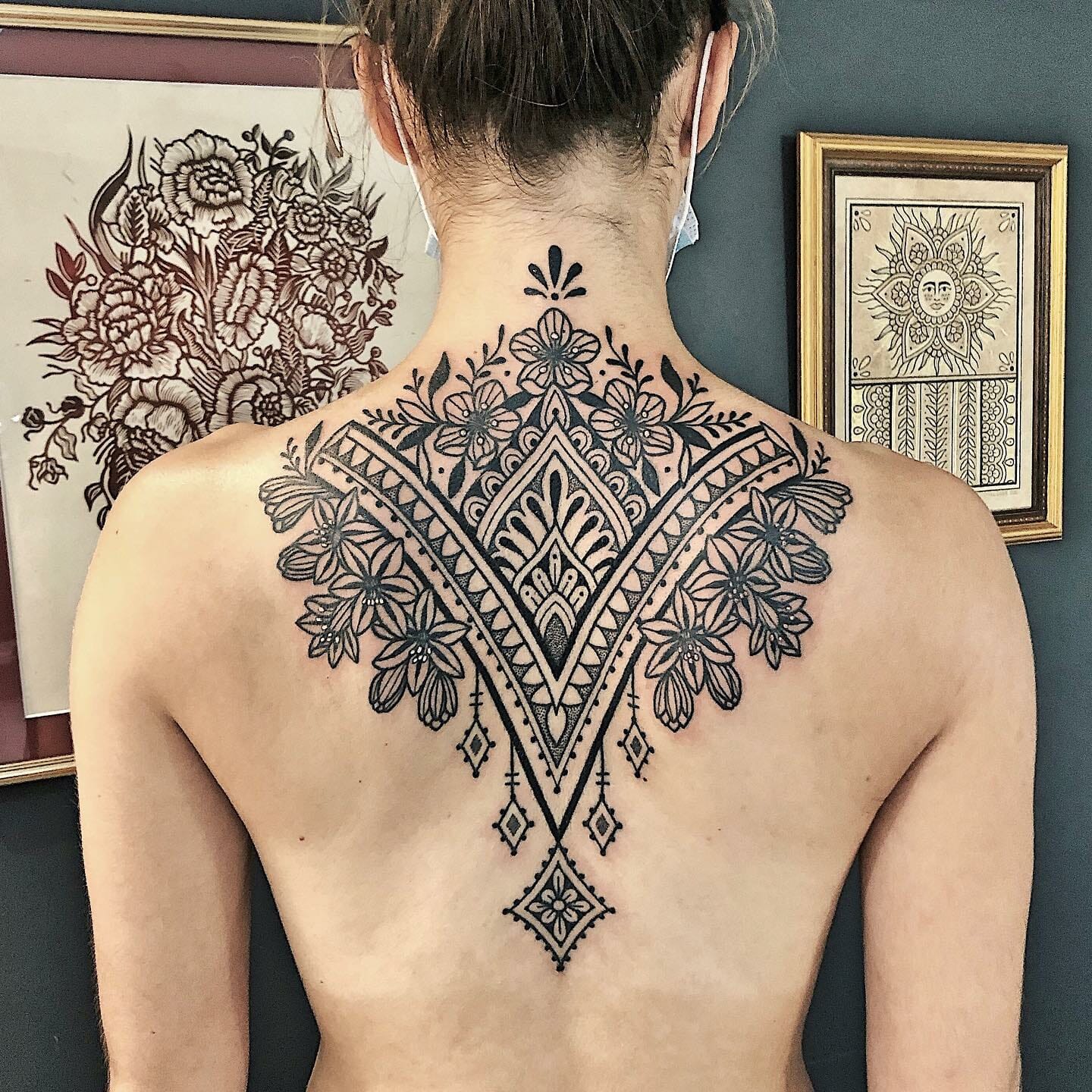 Pretty back tattoo design